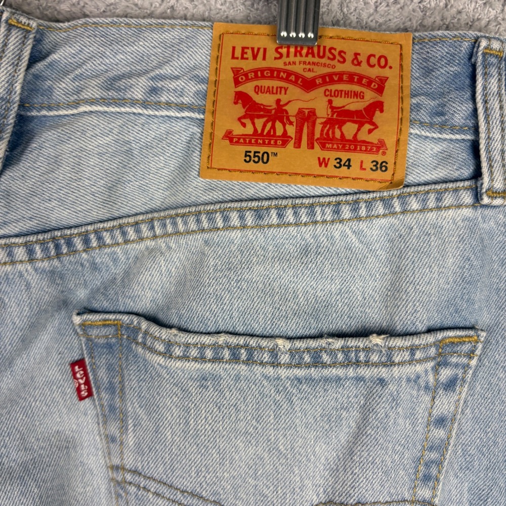Levis Jeans Mens 34x36 Blue 550 Relaxed Fit Tapered Leg Light Wash Denim Faded - Picture 5 of 9